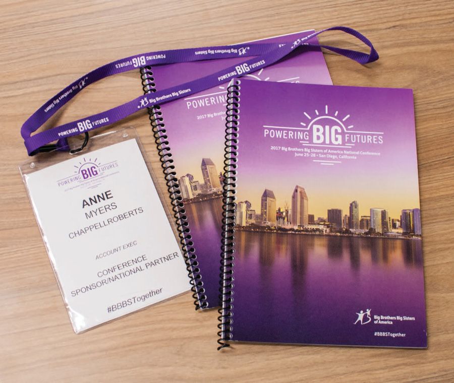 conference print materials and name badge